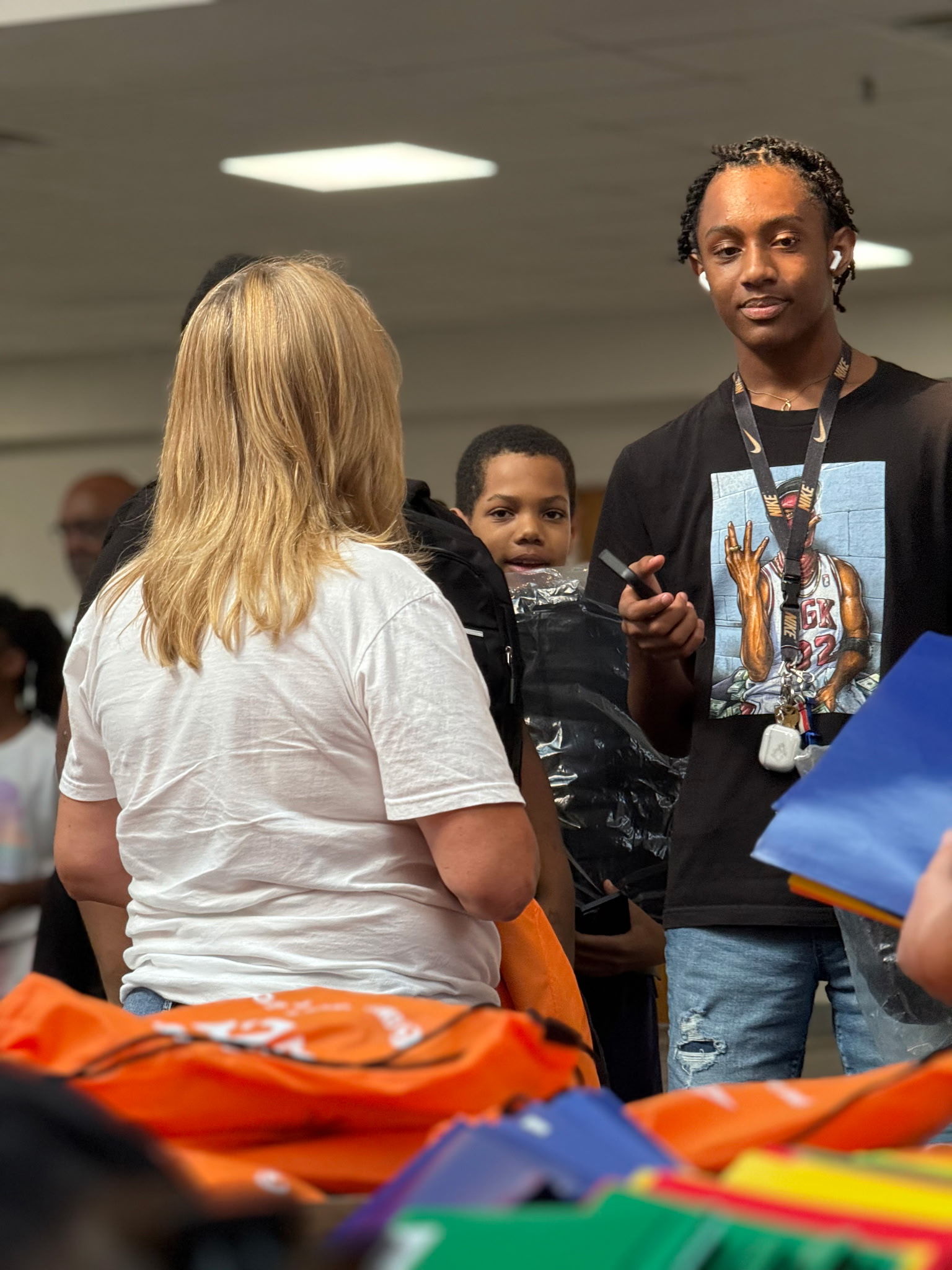 Tulsa-area families grab backpacks and visit booths with supplies and information at the fifth annual Back to School Bash on the OSU-Tulsa campus.