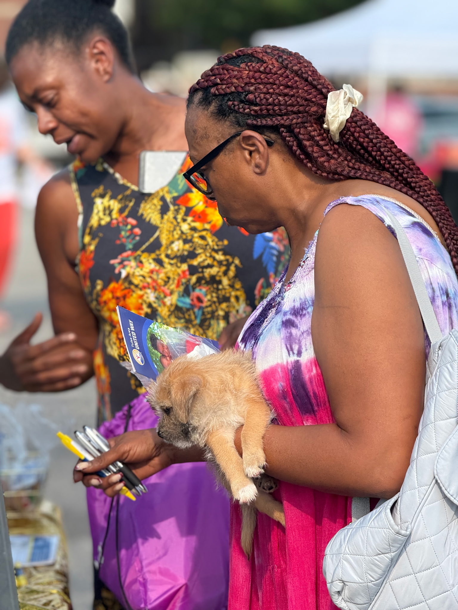 Tulsa-area families grab backpacks and visit booths with supplies and information at the fifth annual Back to School Bash on the OSU-Tulsa campus.