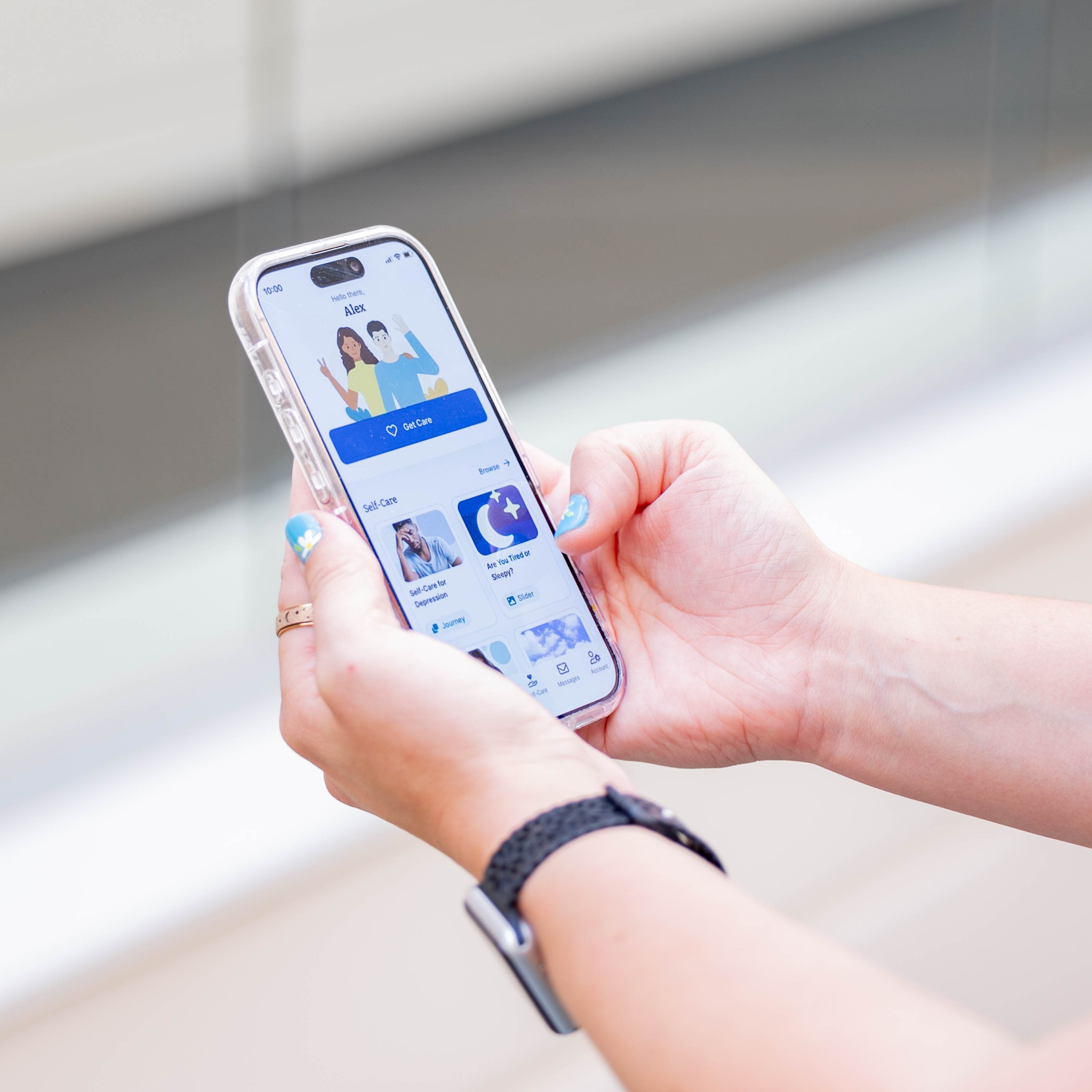 photo shows hands holding cellphone and looking at TimelyCare app on screen
