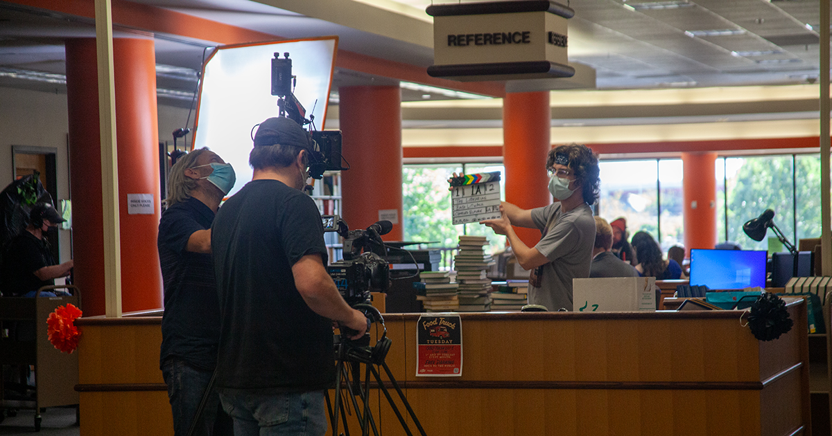 Students of the film set ettiquette workshop learn the ropes in the OSU-Tulsa Library.